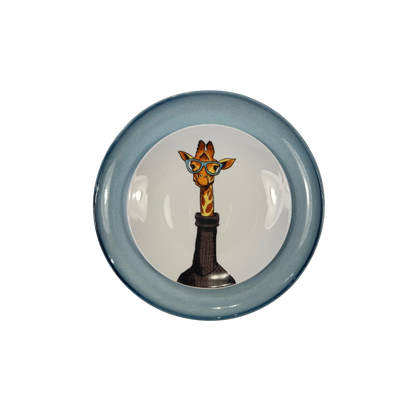 Plato porcelana jirafa sobre plato azul cielo ceramica